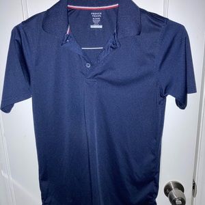 Boys blue polo shirt sleeve
